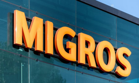 Logo MIGROS sulla facciata di un edificio